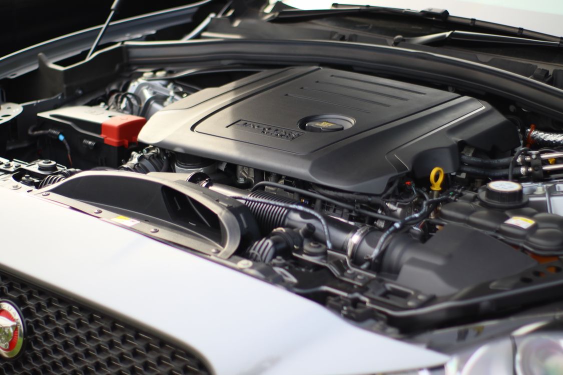 Car engine bay with the hood open